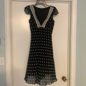 My Michelle Dress size 3/4. Black and cream polka dot with lace detail on front